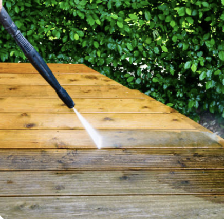 Pressure washing a wood deck